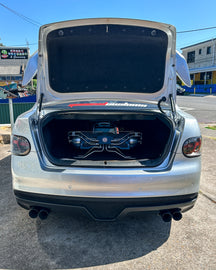 KS RACING Hardline air suspension management unit setup displayed nicely in boot of a Holden HSV VE GTS.