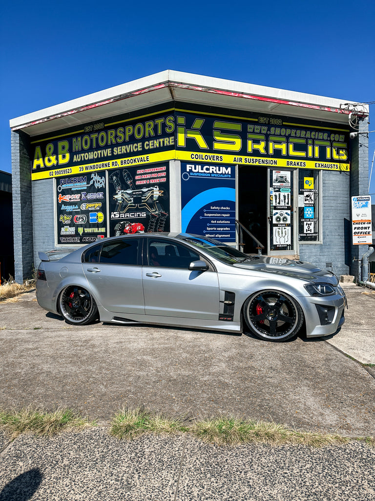 HSV HOLDEN VE GTS on KSPORT KS RACING air ride air suspension kit slammed on the ground. Wheels tucked nicely inside guard, allowing full up and down motion of air struts resulting in exceptional performance to handle the abundance of power this beast makes.
