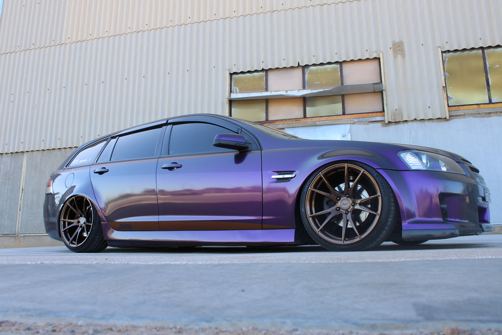 Holden commodore VE Wagon slammed on KS RACING Premium wireless air suspension with ksport performance air struts front and rear and Koya wheels