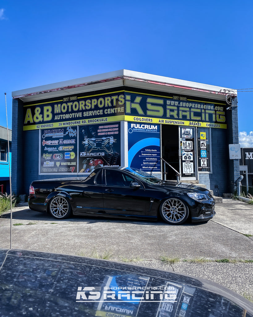 Holden VF Ute riding on a Premium KS RACING wireless air suspension kit with performance air struts front and rear. Slammed VF Ute on 20" Hussla Wheels.