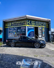 Load image into Gallery viewer, Holden VF Ute riding on a Premium KS RACING wireless air suspension kit with performance air struts front and rear. Slammed VF Ute on 20&quot; Hussla Wheels.