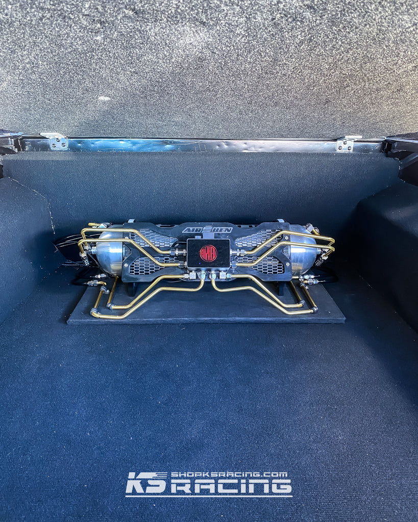 Air ride setup in tub of holden ute. This Holden VF Ute rocking the KS RACING Premium Wireless Air Suspension kit and KSPORT Performance air struts. 