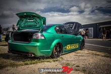 Load image into Gallery viewer, SLAMMED HOLDEN VE ON KS RACING AIR RIDE SUSPENSION WITH 22&quot; BLACK SIMMONS AND KS BIG BRAKE KIT